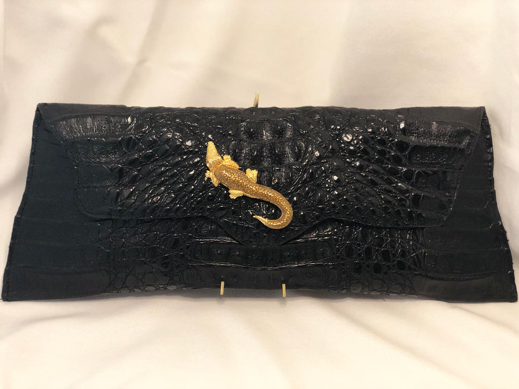 Genuine Long Panamanian Black Crocodile Clutch - Highly Unusual Shape Adorned With Vintage Golden Crocodile Accent On The Front. Dimensions - Height 7.25"; Length 19"; Depth 3.5"