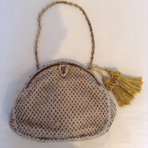 Exquisitely hand-beaded in France, "Bags by Josef" created this precious bag at the turn of the century. Note the finely chased frame and beautiful silk lining.  Dimensions - Height 5 1/4"; Width 6 3/4"; Handle 4"; Depth 2"