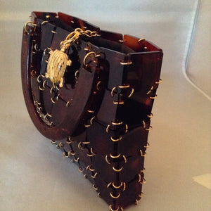 Vintage 1960's brown lucite and chain mail handbag set off with a vintage golden turtle clasp. So unique and so much fun!   Dimensions - 7" Height; 9" Width; 12" Length with handle