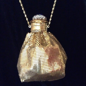 This vintage Whiting and Davis gold mesh lovely purse will even hold your cell phone!  Dimensions - Height 6 1/2"; Width 4";  Length 5"; Chain 17"