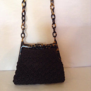 This crocheted vintage purse masterpiece with tortoise link handle is the meeting of Bohemia and Paris.  Dimensions - Height 6"; Length 7"; Length 25"; Depth 3 1/2"