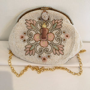 Perfect for the mother of the bride or a romantic bridesmaid, this vintage beaded purse is perfect & will fit all your wedding day needs.  Perfect, too for an evening at the opera or a dressy luncheon event.  By famous maker Walborg in Paris circa 1940  Dimensions - Height 7"; Width 5 1/2"; Depth 3"