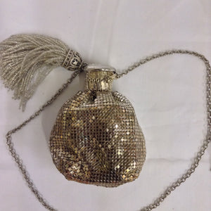 Silver mesh Whiting and Davis vintage purse. Collectible and wearable. Don't worry, your escort can carry your cell phone!  Dimensions - Height 4 1/2"; Width 3";  Handle 21"