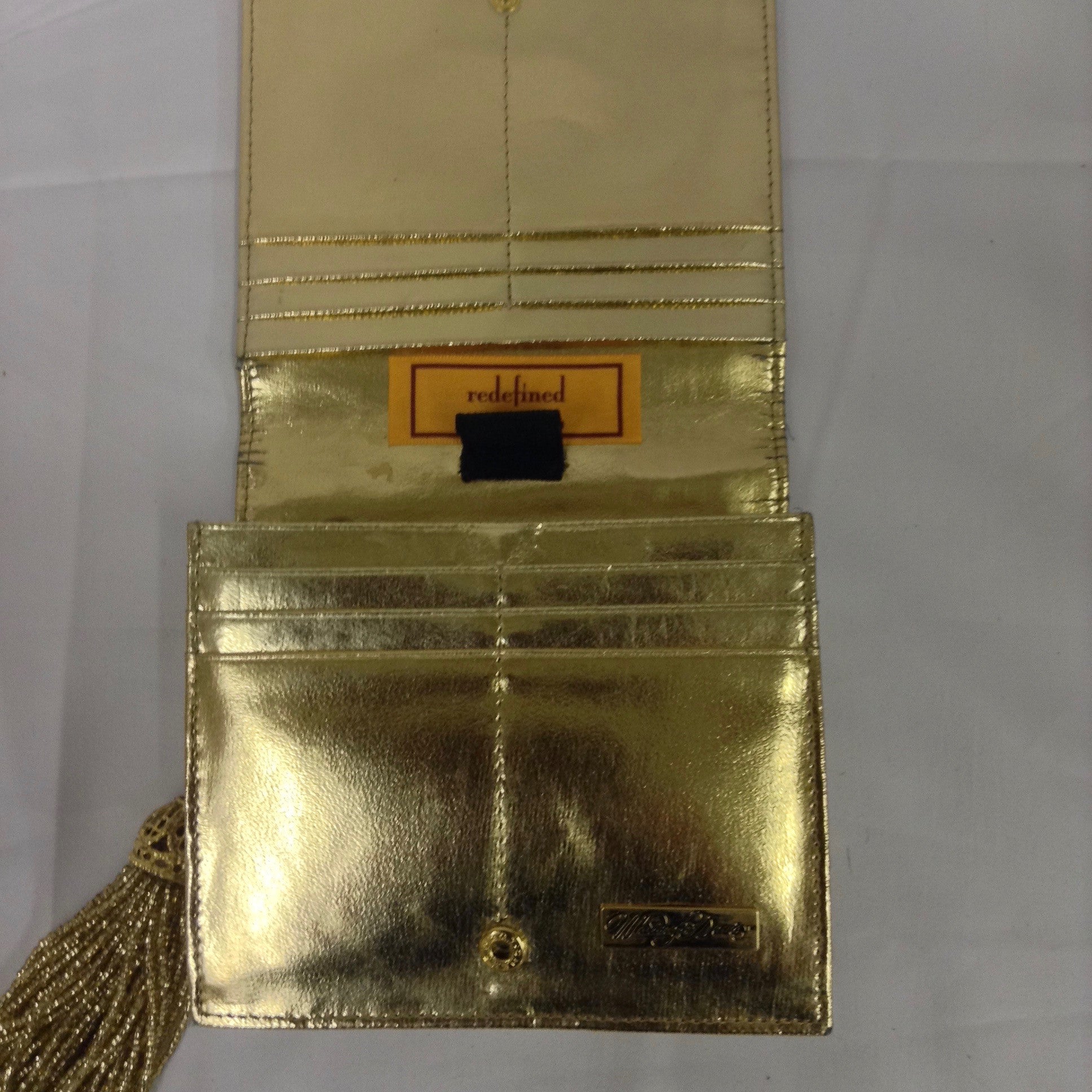 Golden mesh clutch, classic vintage Whiting and Davis with fabulous beaded tassel. Dimensions - Height 5"; Width 5 1/2"; Length 5 1/2"; Depth 1 3/4"
