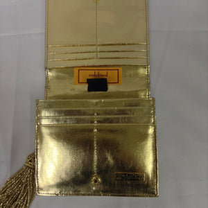 Golden mesh clutch, classic vintage Whiting and Davis with fabulous beaded tassel. Dimensions - Height 5"; Width 5 1/2"; Length 5 1/2"; Depth 1 3/4"