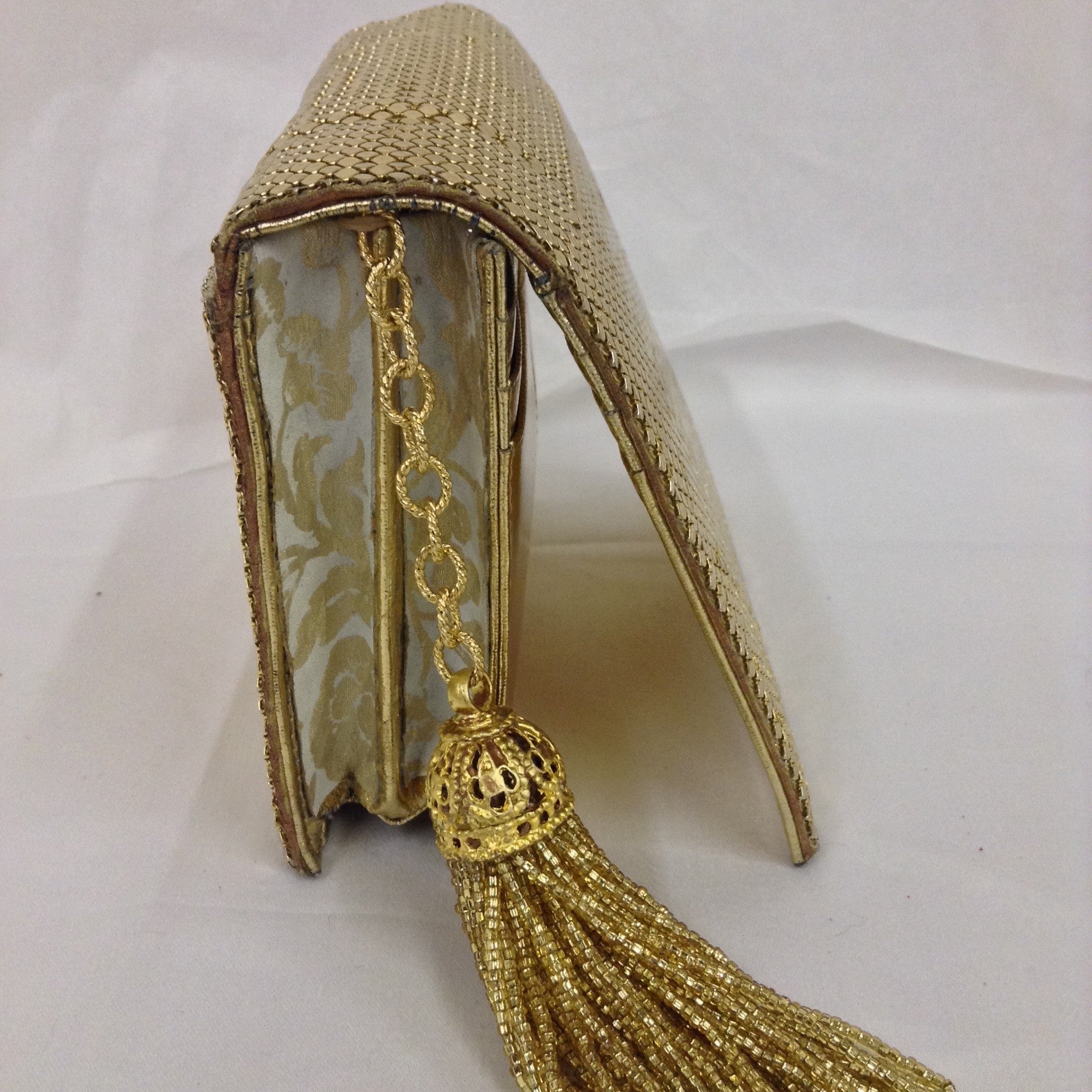 Golden mesh clutch, classic vintage Whiting and Davis with fabulous beaded tassel. Dimensions - Height 5"; Width 5 1/2"; Length 5 1/2"; Depth 1 3/4"