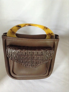 Extraordinary vintage brown crocodile, leather and tortoise lucite handle pouch bag. Originally designed as a lady huntress's shell bag, we thought this was way too pretty to waste on wild game. (But you're welcome to do so!)  Dimensions - Height 9"; Length 7"; Width 2"