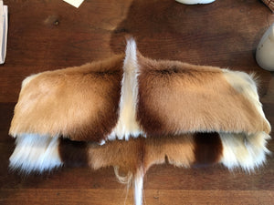 Truly unique, this South African antelope clutch is the softest yet most durable pelt you can buy. Custom made upon your order, you can only buy this clutch from us. Limited quantities.   Dimensions - Height 10"; Width 13"; Depth 5"