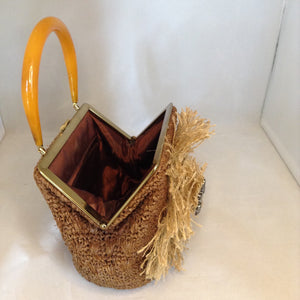 Vintage Brown Raffia Purse Signed MM With Original Amber Lucite Handle And Vintage Marquasite Blue Butterfly On Handmade Tan Burlap Rose. Dimensions - Height 7"; Length 9.5"; Depth 5.5"; Handle 5"