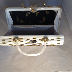Vintage White Shiny British Hong Kong Straw Purse With Golden Metal Weaving, Golden Birds and Bees. White Pearl Lucite Handles. Dimensions - Height 8.5"; Width 11.5"; Depth 3.5"; Handles 4"