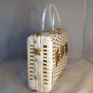 Vintage White Shiny British Hong Kong Straw Purse With Golden Metal Weaving, Golden Birds and Bees. White Pearl Lucite Handles. Dimensions - Height 8.5"; Width 11.5"; Depth 3.5"; Handles 4"
